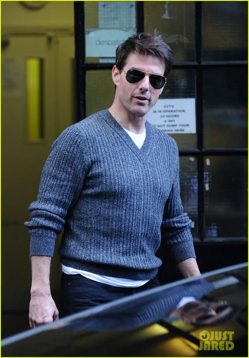 Cruise in blue sweater and sunglasses