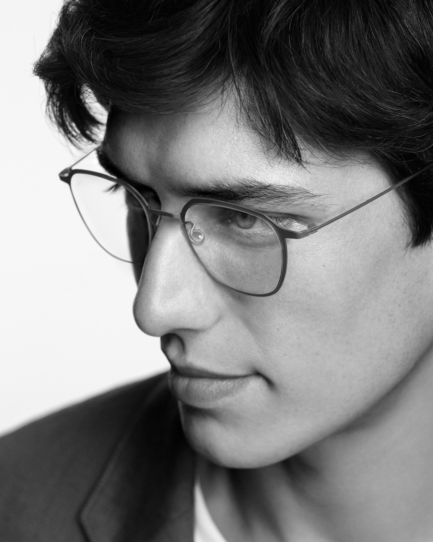 man in Lindberg titanium glasses