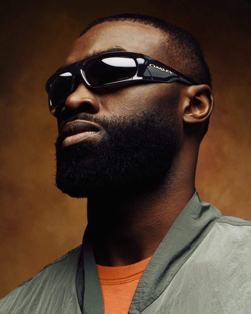 Black man wears Oakley shades